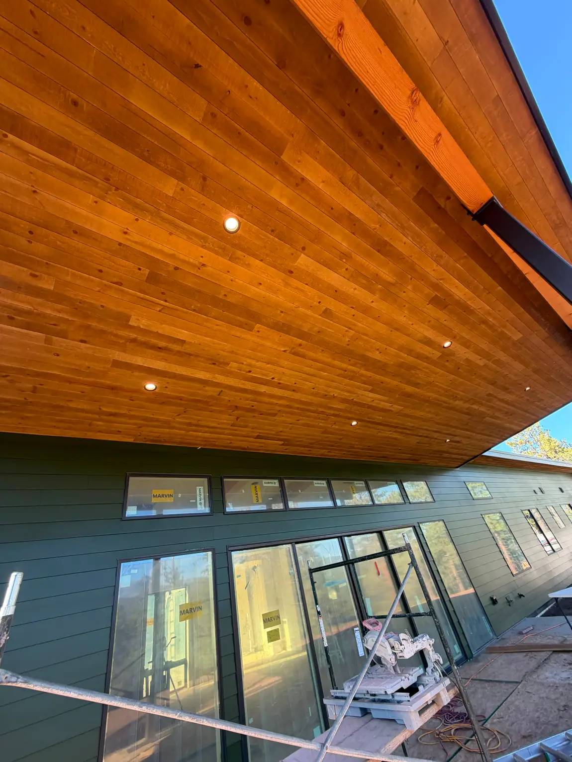 Modern home exterior with covered porch built by JH Construction, San Juan County, NM